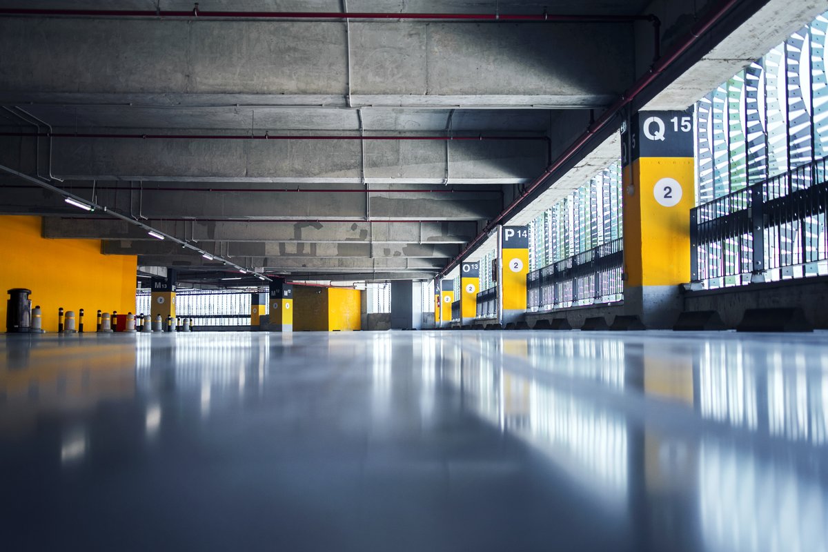 Coated concrete floor in a parking structure